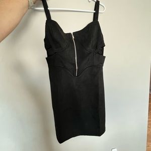 Woman’s black suede dress